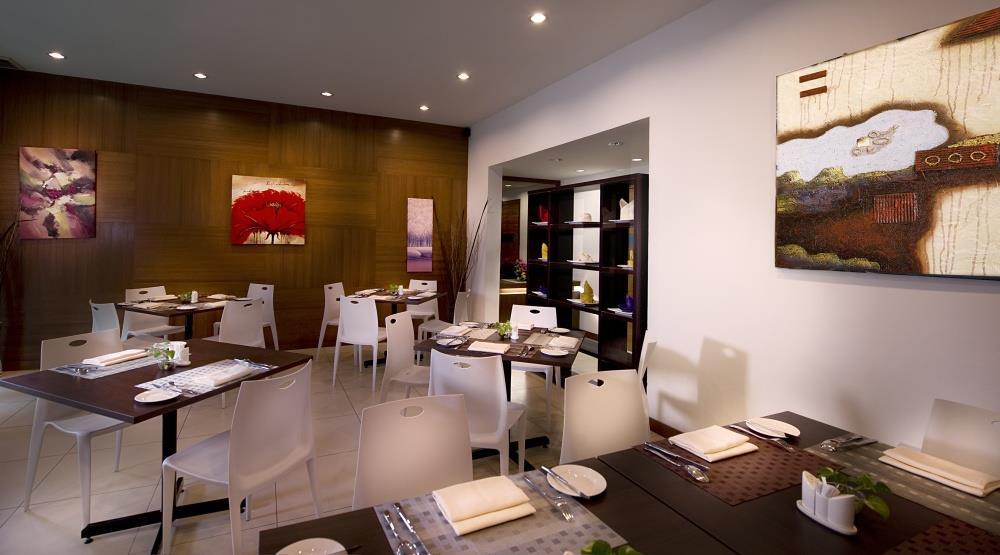 Gloria Swiss Hotel & Apartment سانداكان المطعم الصورة